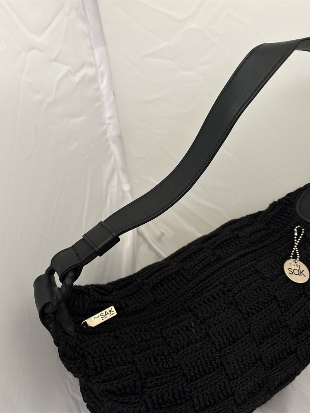 The Sak Black Crochet Shoulder Bag with Leather Strap